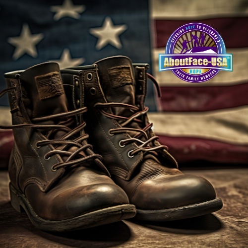 Pair of worn military boots in front of a faded American flag, with the AboutFace-USA logo overlayed, reading 'Offering hope to veterans & their family members.